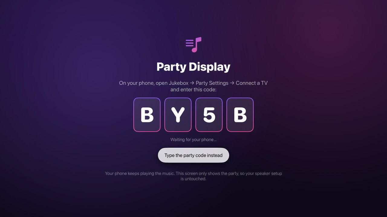Apple TV showing a four-character pairing code to type on your phone